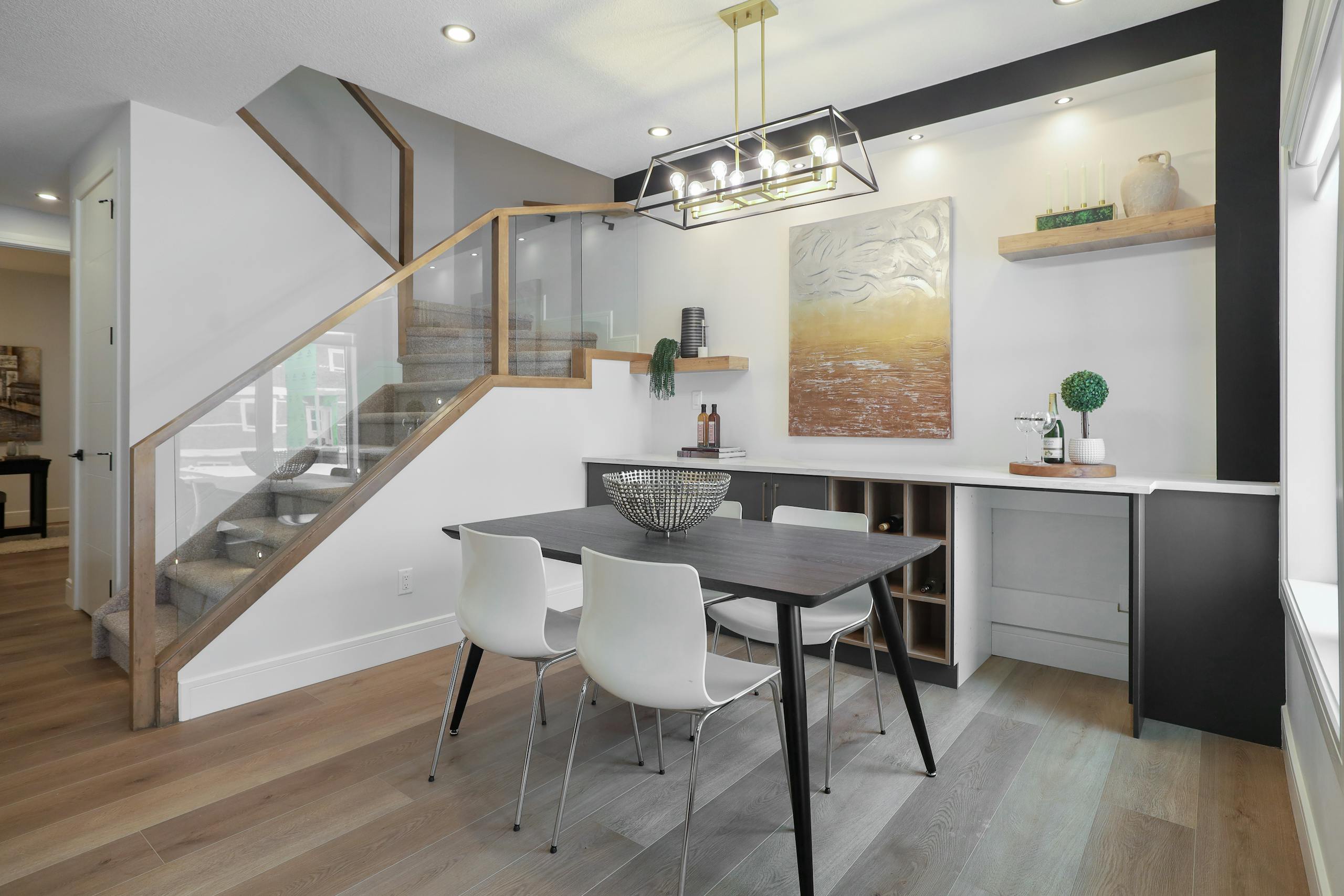 Modern model home dining area prepared for buyer showings