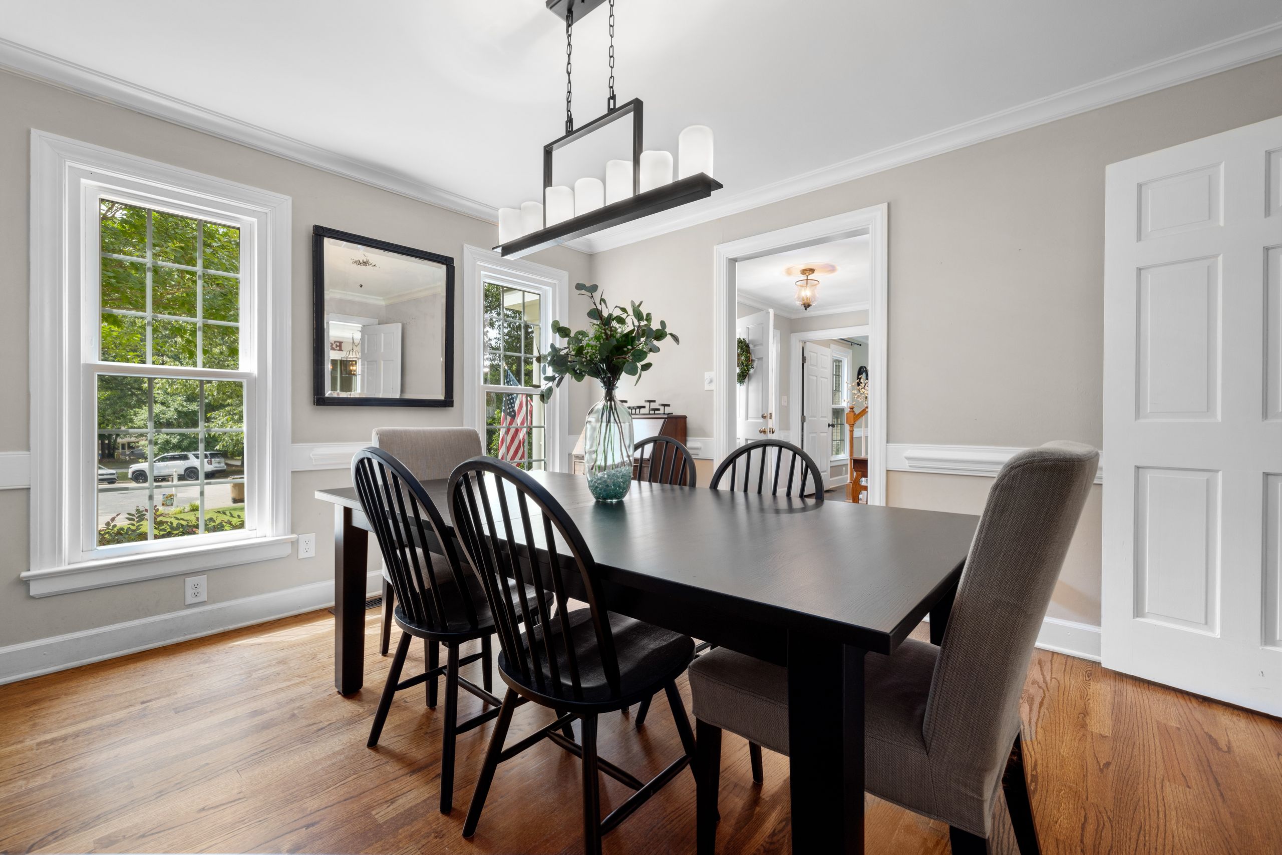 Modern model home dining room maintained for showings