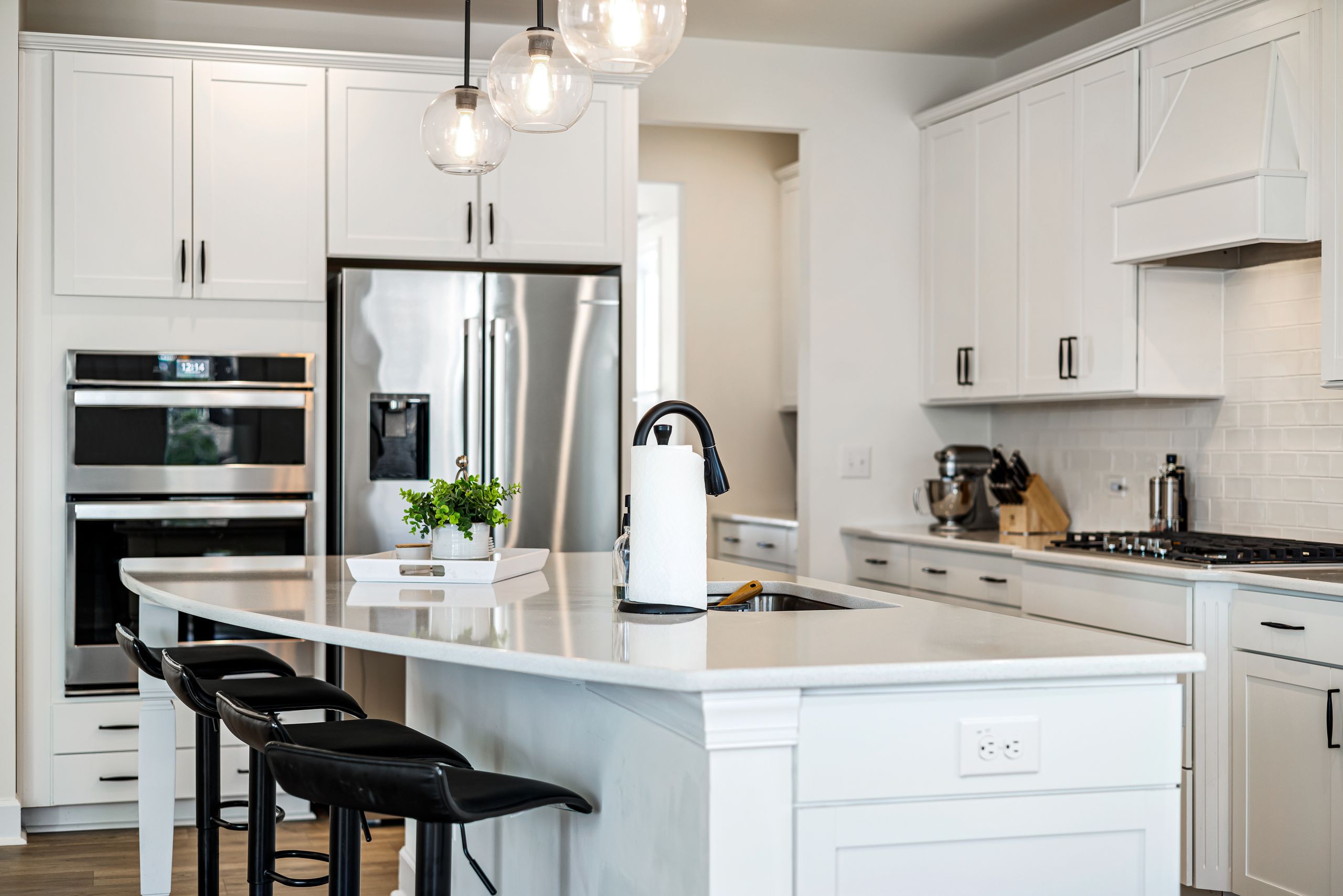 Modern model home kitchen maintained for buyer tours